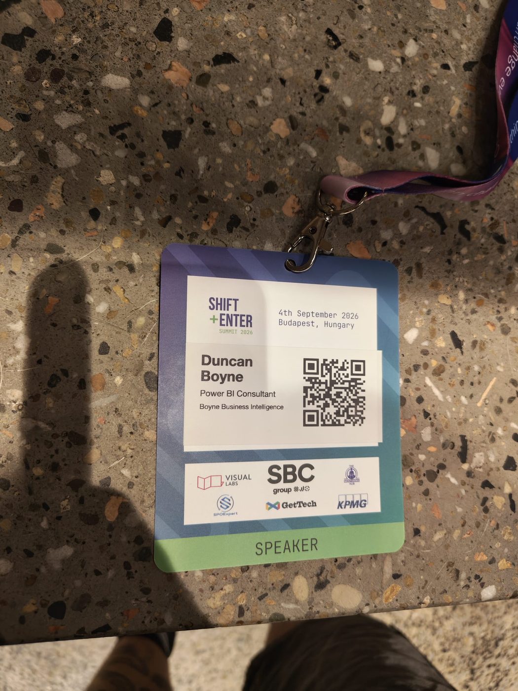 My speaker badge on the steps outside CEU